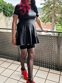 A flexible girl in men s clothes has fun with a cock