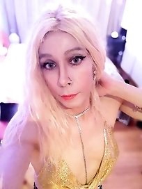 Camelia TS whore in golden sexy top